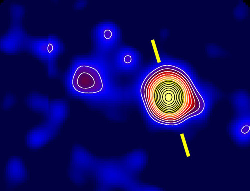 Galaxia 4C60.07 observada con la c�mara SCUBA del telescopio James Clerk Maxwell , las marcas muestran la direcci�n de los chorros de plasma expulsadas por el gigantesco agujero negro dentro de la galaxia